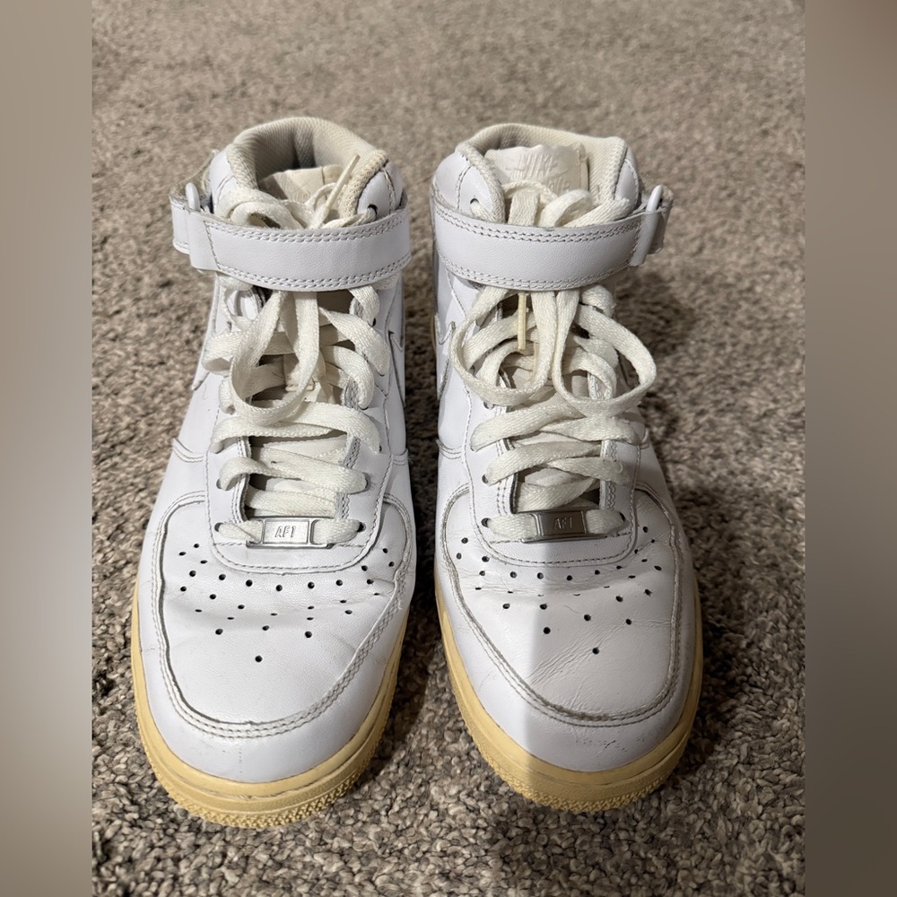 Nike Air Force White High-Top Sneakers with Yellow Soles